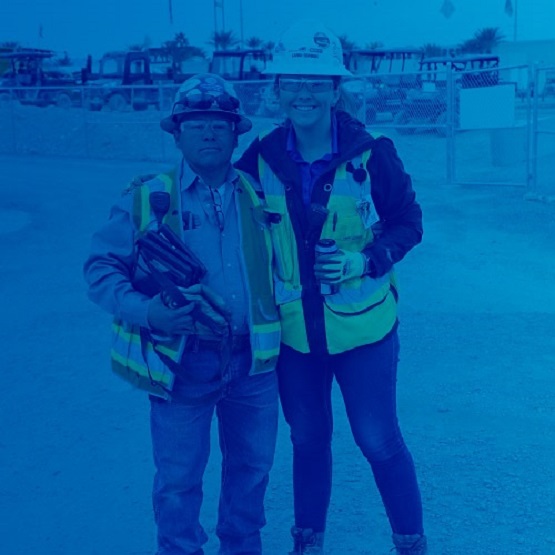 Two MWBE business owners stand together at a jobsite